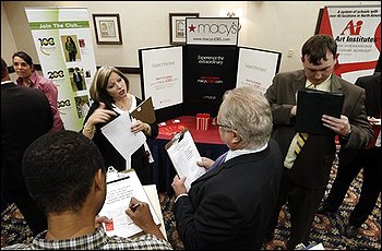 National Career Fair attendees listen to a Macy's recruiter in Richmond, Va., Friday, Oct. 2, 2009. The unemployment rate rose to 9.8 percent in September, the highest since June 1983, as employers cut far more jobs than expected.(AP Photo/Steve Helber)